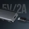 Close-up of a black USB hub with a micro USB cable plugged into its power port, with large text overlay. Produktbild-Vorschau