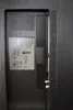 The back panel of a television showing ports and labels. Produktbild-Vorschau