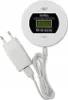 A white carbon monoxide and gas detector with a power adapter and cable, shown on a white background. Voir les images du produit