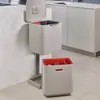 A modern kitchen setting with two recycling bins. Podgląd zdjęcia produktu
