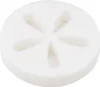 A white disc with a flower-like pattern pressed into it. Produktbild-Vorschau