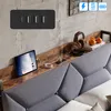 A bed with a headboard featuring a shelf with a tablet, headphones, and fruit. A USB charging hub is mounted on the wall above the shelf. Náhľad obrázku produktu