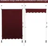 Two different configurations of a burgundy awning are shown side-by-side against a white background. The left image shows the awning fully extended downwards, while the right image shows it retracted with a scalloped edge. Náhled obrázku produktu