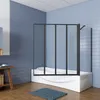 A modern bathroom with blue tiled walls, a white bathtub, and a black framed glass shower enclosure. Produktbild-Vorschau