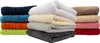 Stacks of colorful towels arranged on a white background. Produktbild-Vorschau