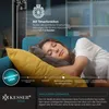 A woman sleeping on a couch next to a tower fan, with promotional text about the fan's features. Produktbild-Vorschau
