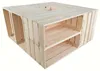 A wooden crate table with shelves and a central opening, presented against a white background. Produktbild-Vorschau