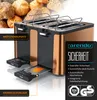 A toaster with bread in the background and marketing overlays. Voir les images du produit