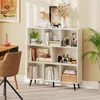 A white bookshelf filled with books and decorative items, placed in a room with a desk and chair. Podgląd zdjęcia produktu