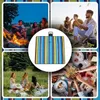 Collage of images showing a picnic blanket in various outdoor settings and close-up of the blanket pattern. Produktbild-Vorschau