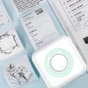 Weißer tragbarer Thermodrucker mit hellgrünem Akzent, druckt ein Versandetikett und andere dekorative Drucke Produktbild-Vorschau
