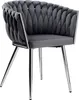 A studio shot of a gray velvet chair with chrome legs. Anteprima dell’immagine prodotto