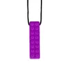 A purple teething necklace shaped like a building block. Produktbild-Vorschau
