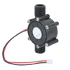 A black micro water turbine generator with red and black wires and a white connector, isolated on a white background. Náhled obrázku produktu