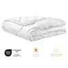 A folded white comforter is shown against a white background, with several certification logos and text below it. Produktbild-Vorschau