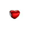 A red heart-shaped charm with a silver opening. Produktbild-Vorschau