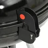 A close-up view of a black charcoal grill's hinge mechanism. Produktbild-Vorschau