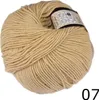 A ball of beige yarn on a white background. Produktbild-Vorschau