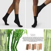 Collage showing black socks on legs and bamboo stalks with packaging of socks. Produktbild-Vorschau