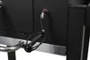A close-up view of a black grill with a silver crank handle. Produktbild-Vorschau