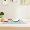 A set of soft play blocks for children, including steps, a tunnel, and a slide, arranged on a light-colored rug in a room with framed art on the wall. Anteprima dell’immagine prodotto