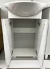 An open white bathroom cabinet with a white sink on top. Voir les images du produit