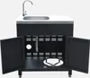 An outdoor kitchen unit with a sink and faucet, showing the open cabinet below. Anteprima dell’immagine prodotto