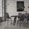A dining room scene with a table and chairs. Produktbild-Vorschau