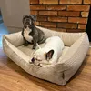 Two French Bulldogs resting in a dog bed. Náhled obrázku produktu