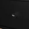 A close-up shot of a black drawer knob on a black drawer. Produktbild-Vorschau