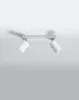 A white ceiling light fixture with two adjustable spotlights is mounted on a white ceiling. Náhled obrázku produktu