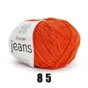 A ball of orange yarn with a label. Náhled obrázku produktu