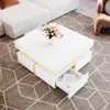 A modern living room scene with a white coffee table as the focal point. Produktbild-Vorschau