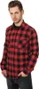 A man wearing a red and black checkered flannel shirt. Produktbild-Vorschau