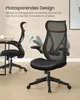 Two black mesh office chairs are shown in a room with a desk. One chair is in the foreground and the other is in the background. Arrows indicate that the armrests can be folded up. Produktbild-Vorschau