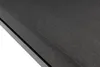 A close-up view of the textured surface of a dark gray lounge chair cushion, with a black frame visible along the bottom left edge. Produktbild-Vorschau