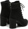 A pair of black Timberland heeled boots shown from a rear-facing angle. Podgląd zdjęcia produktu
