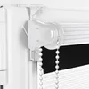 A close-up view of the top mechanism and pull chain of a roller blind. Produktbild-Vorschau