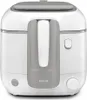 A white and gray Tefal deep fryer is shown from the front on a white background. Produktbild-Vorschau
