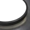 A close-up of a round LED ceiling light with a black rim, showing the illuminated surface and the edge of the fixture against a textured gray surface. Produktbild-Vorschau