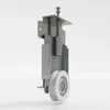 A close-up studio shot of a sliding door roller mechanism against a white background. Produktbild-Vorschau