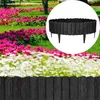 A garden scene with flower beds and a black garden border in a circular inset. Náhľad obrázku produktu