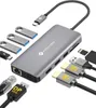A collection of computer accessories, including a docking station and various cables and adapters, arranged on a white background. Produktbild-Vorschau