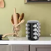 A kitchen counter with a spice rack and wooden utensils. Náhled obrázku produktu