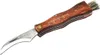 A mushroom collecting knife with a wooden handle and a brush on the end, shown against a white background. Podgląd zdjęcia produktu