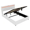 A white upholstered bed frame with the storage lift mechanism open, revealing the slatted base and hydraulic supports. An orange LED light strip is visible along the top of the headboard. Náhled obrázku produktu