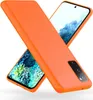Two orange phone cases are arranged in an X shape, with one partially covering the other. The phone screens are visible, displaying abstract blue and green images.