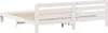 A white wooden bed frame with a slatted base, viewed from the side and slightly from the back. Produktbild-Vorschau