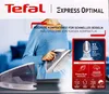 A woman is holding a Tefal iron with steam coming out, next to a water tank. The background shows a blurred living room setting. The image also includes marketing text and feature callouts. Produktbild-Vorschau