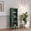 A tall, narrow green cabinet with glass doors stands in a room with a plant and decorative lighting. Anteprima dell’immagine prodotto
